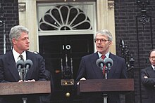 Prime Minister John Major and President Bill Clinton deliver press statements in 1995 President Clinton and Prime Minister John Major of the United Kingdom deliver press statements.jpg