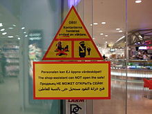 Sign in a shop in Swedish, English, Arabic and Russian. Quadrilingual store sign - 2008-01-31 (gabbe).jpg