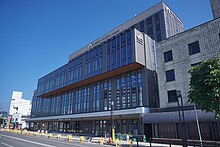 ファイル:Redevelopment_building_in_front_of_Yokote_Station.jpg