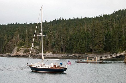Cruising sailing yacht at anchor in Duck Harbor on Isle au Haut, Maine