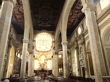 Nave looking east, showing the high arches of the arcades Sarzana-cattedrale-navata centrale.jpg