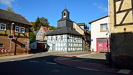 Village center with half-timbered church