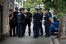 A group of SA police officers on scene South Australia Police officers at a protest.jpg