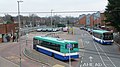 English: A photograph of Horley station interchange, Horley, Surrey. The bus on the right of the photo is Southdown PSV 110 (YX59 BZD), an Alexander Dennis Enviro200 Dart, leaving the interchange on route 527. The bus on the left is Southdown PSV 113 (LK55 ADZ).