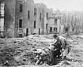 The London Blitz - V2 Rocket Bomb Incident at Chinatown, Limehouse, East London, March 1945 HU44973.jpg