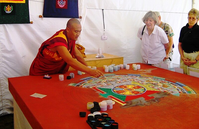 File:Tibetan Monk creating sand mandala. Washington, DC.jpg