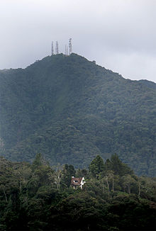 Mount (Gunung) Batu Brinchang: The radio and television station is at the peak of the mountain. Moonlight bungalow (now the Jim Thompson cottage) is in the foreground. The pre-war house is still a draw for the many who have had an interest in the mysterious disappearance of Jim Thompson in the Cameron Highlands. Photo credit: Time Tunnel museum.