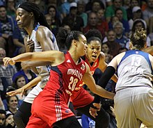 Toliver attempts a steal from Lindsay Whalen in 2017 Toliver steal-20170914.jpg