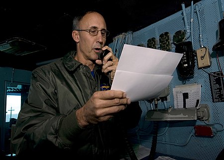 Vice Admiral Van Buskirk at USS George Washington. US Navy 101206-N-9626Y-001 Vice Adm. Scott R. Van Buskirk, commander of the U.S. 7th Fleet, addresses the crew of the aircraft carrier USS George W.jpg