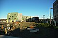 Part of the unfinished The Round in Beaverton, Oregon. Foreground is the NW corner, background is the completed NE corner.