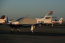 A late-model 114; with a different-shaped engine cowling and fresh-air inlet in the leading edge of the tail fin (seen in this photo with a red plug to prevent birds entering). VHRNS.JPG