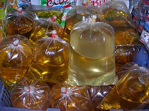 Vegetable oil in plastic bags for sale - Thailand.JPG