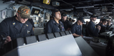 The bridge of USS George H.W. Bush, where the message handling system is used. Watch on the bridge on aircraft carrier USS George H.W. Bush prepares to anchor in Haifa 1 July 2017.png