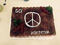Tiramisu cake including Service Civil International (SCI), peace symbol and Wikipedia