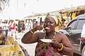 Woman Eating Rice