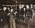 'Sir M Campbell watches finishing touches to 3 millionth Hercules bicycle, 1934.jpg