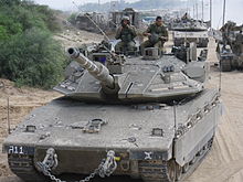 טנקי מרכבה סימן מ4 ודחפורי D9 משוריינים מובילים טור משוריין במבצע צוק איתן