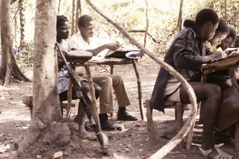 File:ASC Leiden - Coutinho Collection - C 02 - School in Sara, Guinea-Bissau - Illiterate guerrillas at school (with rifle ready) - 1974.tif