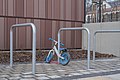 * Nomination Children's balance bike on a bicycle rack in front of a gym in Leipzig. --Augustgeyler 06:50, 6 March 2023 (UTC) * Promotion  Support Good quality. --Ermell 09:17, 6 March 2023 (UTC)