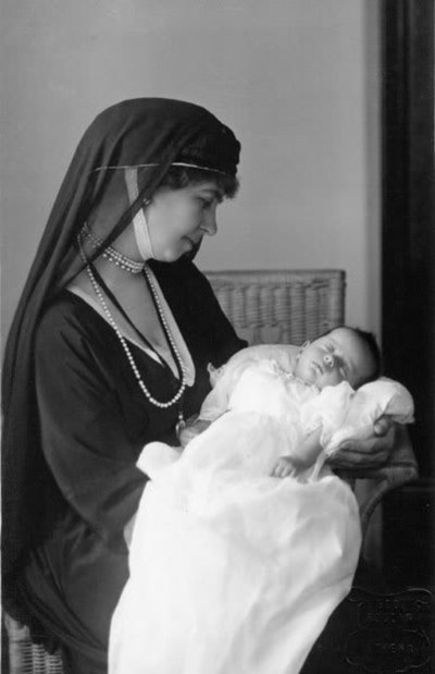 Queen Sophia of Greece holding her granddaughter Alexandra, April 1921.