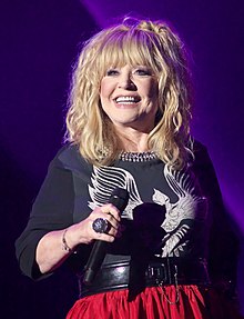 Portrait of Pugacheva performing on stage in 2016.