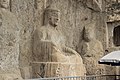 Ancient Buddhist Grottoes at Longmen- Three Buddhas on the Cliff, Buddha on the Northern Side.jpg