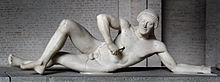Warrior from the west pediment of the temple of Athena Aphia, in Aegina, c. 505-490 BCE. Aphaia pediment warrior W-VII.jpg