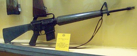 An early M16 rifle without forward-assist. Note: "duckbill" flash suppressor and triangular handguard