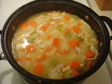 Homemade chicken noodle soup cooking