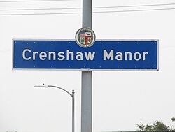 Crenshaw Manor neighborhood sign located at the intersection of Crenshaw and Obama Boulevards