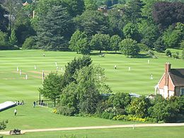 A cricket game at The Parks Cricket at University Parks, Oxford.jpg