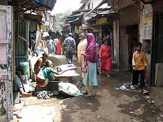 Slums such as this one, in Mumbai, are the result of extensive urban growth. Slum upgrading's goal is to transform these areas into decent housing areas. Dharavi Slum in Mumbai.jpg