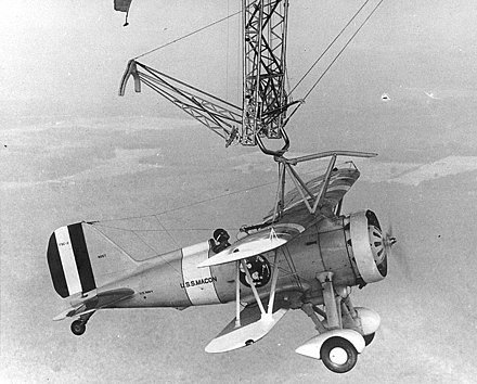 An F9C-2 captures the trapeze aboard Macon in 1933