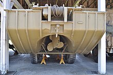 Rear view of a DUKW preserved at the Fort Lewis Military Museum, Washington. The propeller tunnel, propeller, and rudder can be seen (2009). FLMM - DUKW 353 aft.jpg