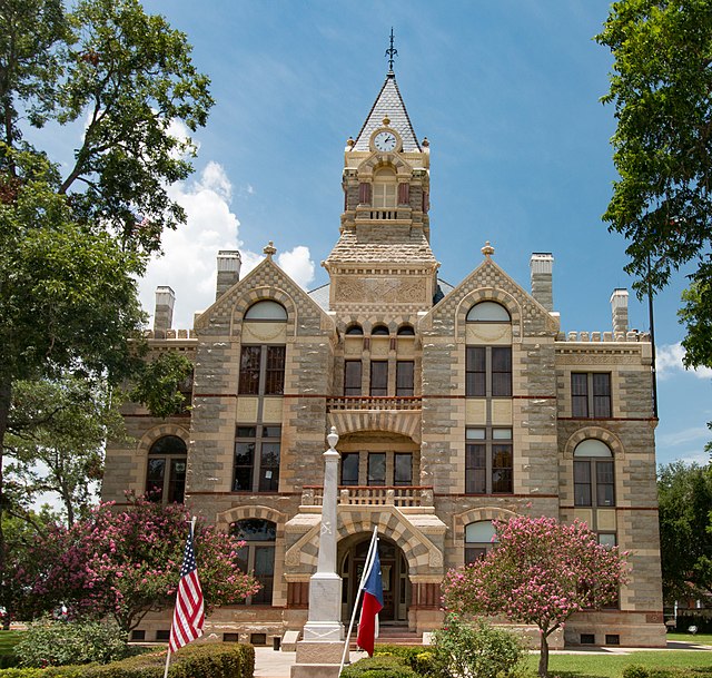 The current Fayette County Courthouse in La Grange was finished in 1891. The Romanesque Revival style building uses four types of native Texas stone t
