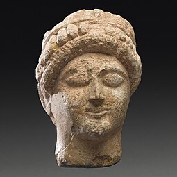 Женская вотивная голова Кипр (?), [22] начало V века до н.э.