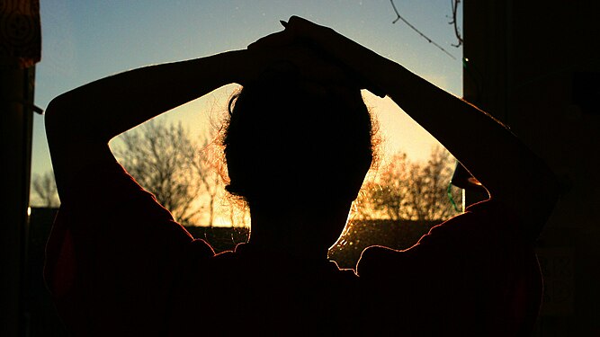 Silhouette of a girl in sunrise