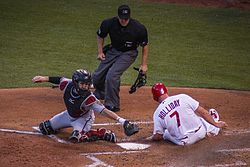 Gosewisch and a sliding Matt Holliday in 2015 Holliday safe at home.jpg