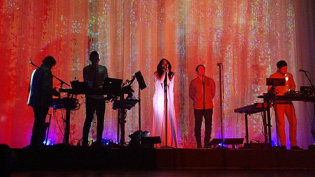 How to Destroy Angels performing in April 2013; from left to right: Alessandro Cortini, Atticus Ross, Mariqueen Maandig, Trent Reznor, and Rob Sherida