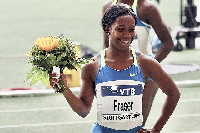 Fraser-Pryce celebrates after winning the 100 m at the 2008 World Athletics Final.