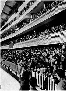 Crowds in three tiers directly on top of each other