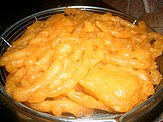 Hot Mauritian jalebi, also known as Gato Moutaille