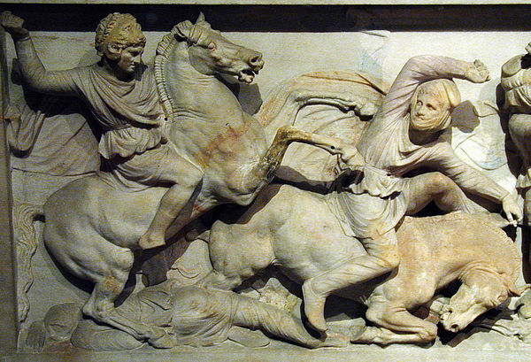 Alexander the Great as a cavalryman. He wears a helmet in the form of the lion-scalp of Herakles. Detail of the so-called Alexander Sarcophagus, excavated at Sidon.