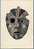 Painting of carved and painted wooden mask.