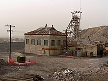 A mine in the mining boom town of Broken Hill, where a miner's strike occurred in 1892. Broken Hill endured significant prosperity on the back of its mining industry throughout the 20th century. Mine - panoramio (6).jpg
