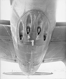 The IFF/Lucero antenna can be seen projecting downward just behind the guns in this image of the lower fuselage of a Mosquito NF.XIII. Mosquito NF Mk. XIII guns CH14646.jpg