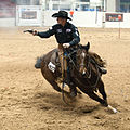 Cowboy mounted shooting at the 2012 AQHA Mounted Shooting World Championship.