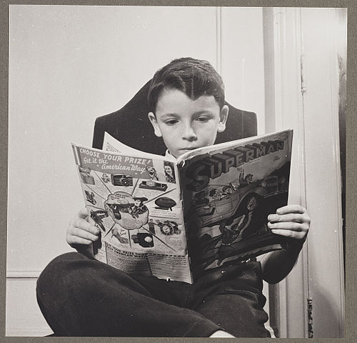 German refugee child at N.Y. Children's Colony, 1942, reading a Superman comic book.