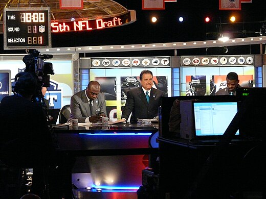Irvin (right) with the NFL Network in 2010