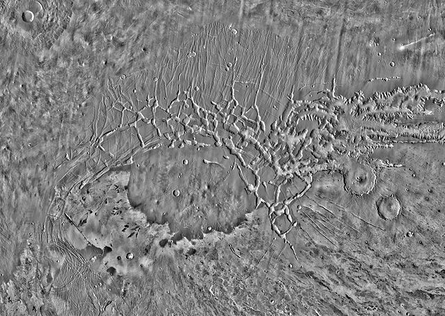 High resolution THEMIS daytime infrared image mosaic of Noctis Labyrinthus and its surroundings. The area is crisscrossed by multiple sets of graben r